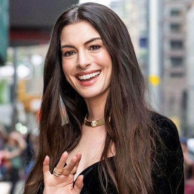 Anne Hathaway Debuts the Ultimate High-Low Outfit With a $99 Bag and a Five-Figure Bulgari Necklace