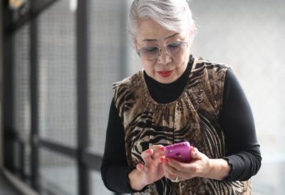 ‘How do I end a call?’: the elderly Japanese people determined to master smartphones