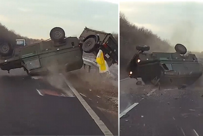 Driver flung from army truck after car swerves in front of military convoy