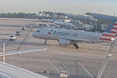 Plane forced to slam on brakes to avoid hitting truck at airport