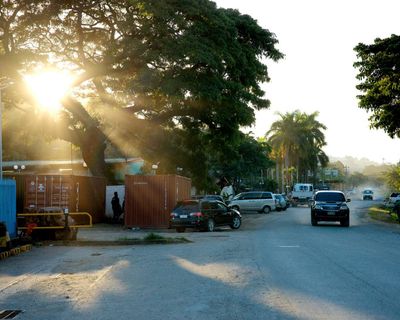 Inside smoky shelters, a fast-paced, illegal card game has taken off in Solomon Islands