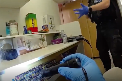 Police uncover secret ‘trap door’ crammed full of illegal cigarettes in Kent shop raid