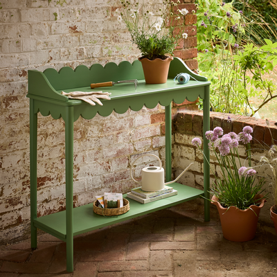 Argos is selling the chicest scalloped potting table – it’s perfect for showing off potted plants in a tiny garden
