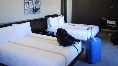 Woman asked to share a bed with her brother’s boyfriend and demoted to a cot on her own birthday trip — but the internet thinks she’s the problem