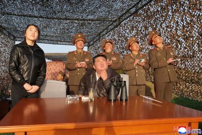 Kim Jong Un and daughter look on as North Korea tests multiple ballistic missiles