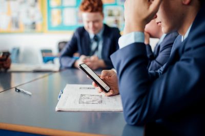 Mobile phones to be banned in schools in England under government plans