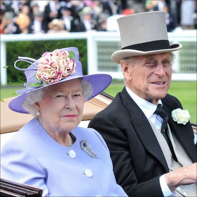 Royal Aide Reveals How Queen Elizabeth Reacted When Prince Philip Started "Pinching Her Bottom Repeatedly and Growling"