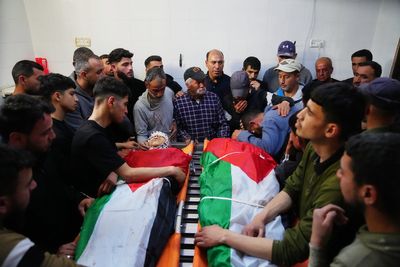 Israeli army reservist kills 2 Palestinians, including a 14-year-old, in the occupied West Bank
