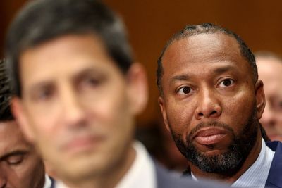 Internet sleuths go crazy as NFL Hall of Famer Larry Fitzgerald sits behind Trump Fed Chair pick Kevin Warsh