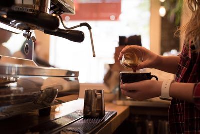 Takeaway coffee sales plunge as fuel and living costs dent Australian spending. Is the economy next?