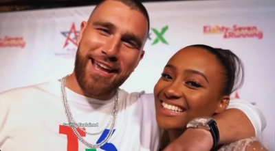 Travis Kelce's Ex Called 'Hypocrite' for Speaking on Domestic Violence After Being Humped by Chris Brown Onstage