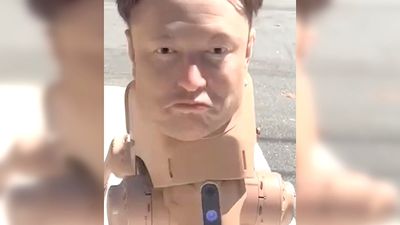 An Elon Musk-faced robot dog wanders the streets of San Francisco, and surely this must be a sign of the apocalypse