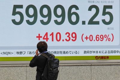 Asian stocks retreat and oil tops $100 despite fresh records on Wall St