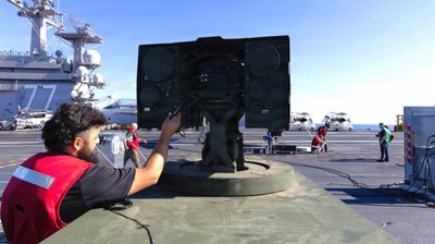The $5 Drone Killer: The Navy’s new 20kW LOCUST laser just proved its "unlimited magazine depth" on the USS George H.W. Bush — it neutralized multiple UAVs for a fraction of the cost of a missile, protecting the fleet from cheap enemy drone swarms