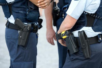 Queensland police recall 15,000 service-issued Glock handguns after discovery of fault causing multiple shots to fire