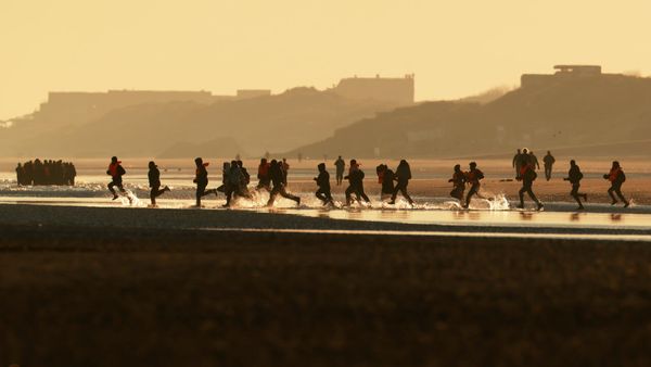 France, UK agree to new migrant deal, with funding tied to results