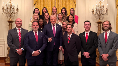 Donald Trump 'Honours' UGA Women's Tennis Champions With Bizarre Photo Featuring Only Men In The Foreground