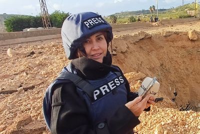 Lebanese journalist killed by Israeli strike was left under rubble for hours with no medical care, say officials