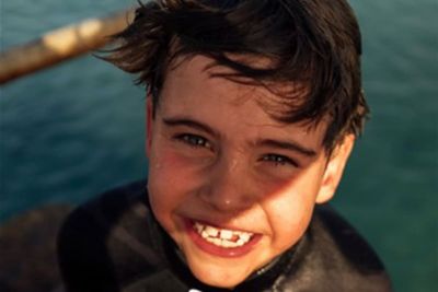 Beach boy Louis’s 8th birthday celebrated with video of prince jumping into sea