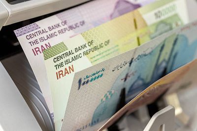 Iran's Economy Buckles As Currency Slides And Oil Risks Escalate Amid Conflict