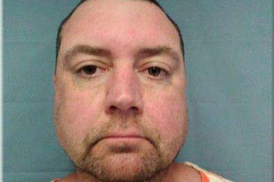 Former cop arrested for plotting mass shooting at New Orleans festival, police say