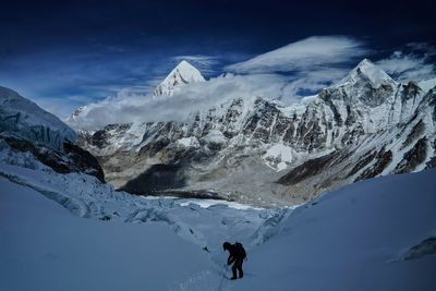 A massive, unstable ice block stalls Everest climbers at base camp