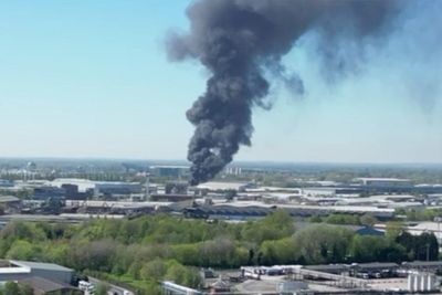 Huge Manchester fire seen for miles around as police close roads