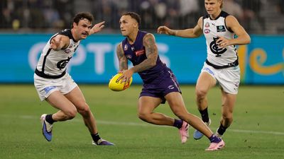 Gritty loss to Dockers caps off horror week for Carlton