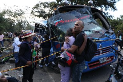 Explosive device on a bus kills 7 in southwest Colombia as violent attacks persist