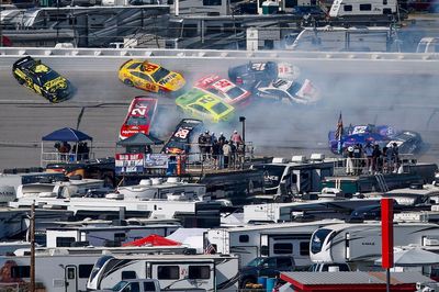 At least 25 cars wreck in massive crash, stopping Talladega Cup race