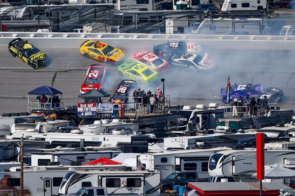 At least 25 cars wreck in massive crash, stopping Talladega Cup race