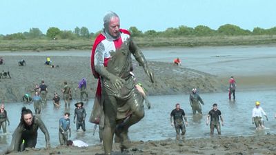 Runners battle mud at annual UK charity race