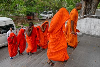 22 Buddhist monks found with 110kg of drugs on Bangkok flight, police say