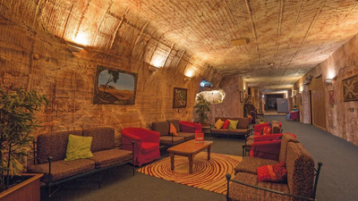 An underground world: The Australian town where life exists beneath ground, with churches and hotels under the desert