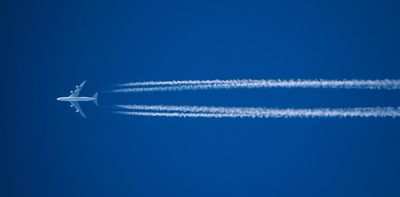 Here’s what we know about the climate cost of white trails aircraft leave in the sky