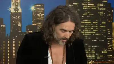 Russell Brand embarrasses himself in painful interview with Piers Morgan as the two men sit in silence for a full 90 seconds