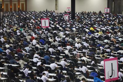 Ex-director of elite Bangkok school jailed for 27 years over admissions bribes