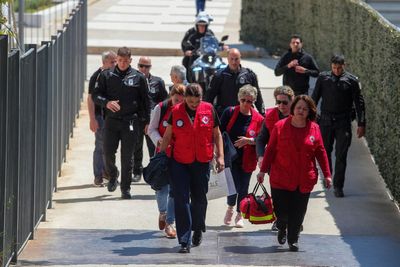 Police hunt 89-year-old gunman after several wounded in Athens shooting