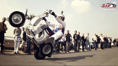 A Bunch of Vespa Scooters Once Raced on a Rooftop Race Track, And It's So Much Cooler Than It Sounds