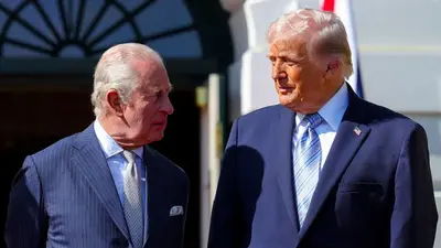 Donald Trump tries his aggressive handshake routine on King Charles, who shakes him off like an annoying fly