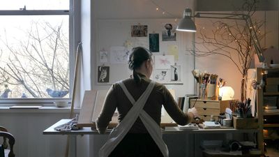 Thrifted wood furniture and wild squirrel visits: This home office brings the outside in