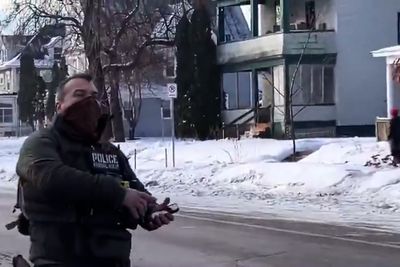 ICE officer who shot Minnesota protester reassigned amid stalled investigation