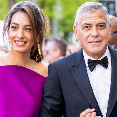 Amal Clooney Recycles Her Euro Summer Color Combination With the Least Predictable Styling