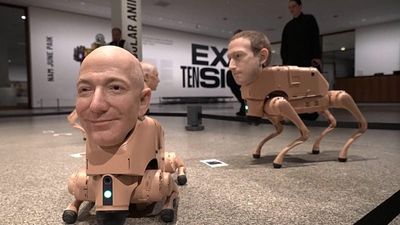 Watch: Robot dogs with Elon Musk and Bezos' faces are excreting AI art at a Berlin museum
