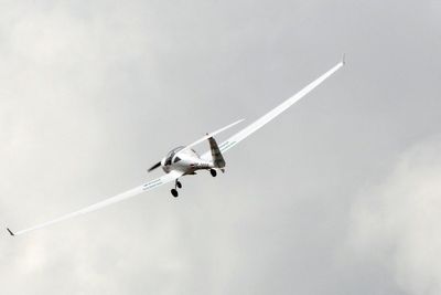 Pilot among two killed as plane crashes into hangar in Australia