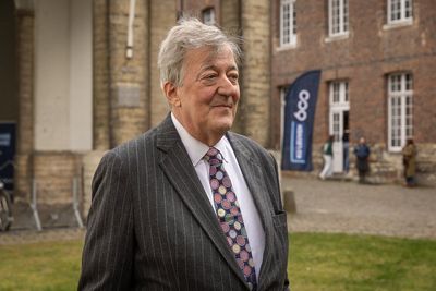 Sir Stephen Fry sues conference for up to £100,000 after fall from stage