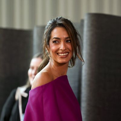 Amal Clooney's Barbie Ponytail Has Me Longing For Summer Parties and Beach Getaways