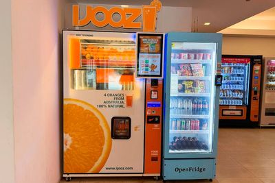 French teen charged in Singapore over a vending machine straw-licking video