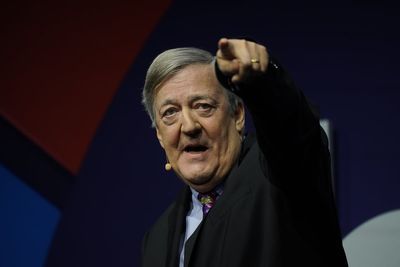 Stephen Fry sues tech conference after breaking leg, hip and ribs in 'nasty' six-feet fall at O2