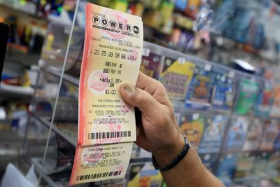 Powerball players urged to check tickets as nearly 100 people wake up as millionaires